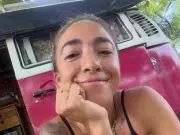 Influencer saved from 140ft waterfall by her swimsuit