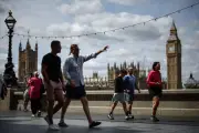 Is it okay for men to wear shorts to the office during a heatwave?
