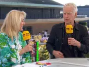John McEnroe explains why he's 'in mourning' at Wimbledon in all-black outfit