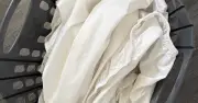 Keep White Bedding Bright and Crisp by Drying in Sunlight After Washing