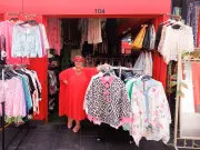 Kirkby Market's Amanda Wade Becomes Social Media Sensation with Colourful Outfits