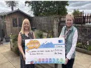 Larkhall volunteers get £500 from building firm to keep handyperson service