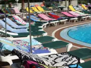 Lifeguard Hailed Hero After Removing Unused Towels From Sunbeds in France