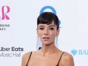 Lily Allen Turns Heads in Black Lace Bralette at Silver Clef Awards