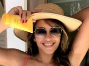 Liz Hurley Dubbed 'British Goddess' in Orange Bikini Photos