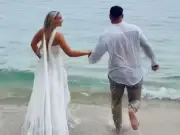 Love Island Star Lucie Donlan Runs Into Sea in Wedding Dress