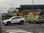Major Emergency Response at Llandudno McDonald's: Police and Ambulances Swarm Retail Park