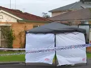 Man Arrested After Relative Found Dead Outside Burning Home with Burns