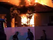 Man dead, two critical after suspected arson on Gold Coast
