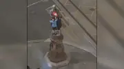 Man Falls 15ft Trying to Place Cone on Edinburgh Robert Burns Statue