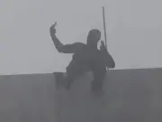 Masked Man Scales 460ft Bolte Bridge, Demands Taxes Cut and Sandwich