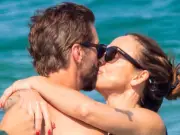 Melanie C kisses husband Chris Dingwall on Ibiza honeymoon