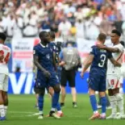 Michael Olise in tears after France's World Cup defeat to England