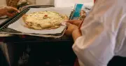 Olive Oil Brushing Makes Frozen Pizza Crispier, Says TikTok Cook