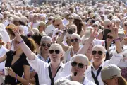 Pitbull aims for record gathering of people wearing bald caps at BST Hyde Park