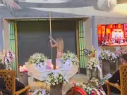 Pole Dancer Performs Racy Show at Funeral for Exhumed Nightclub Boss and Wife