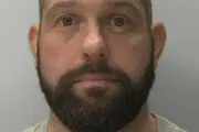 Police review four deaths at shelter where serial killer lived