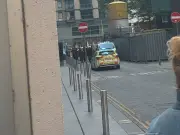 Police search Manchester city centre after prisoner escapes court