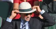 Prince George Amuses Family with Hat Fiddling at Wimbledon Final