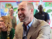 Prince William Receives Gifts for Kate and Children at Welsh School Visit