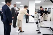 Princess Anne Shakes Hands with Humanoid Robot in South Korea