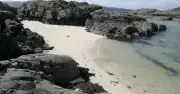 Remote UK Beach on Private Island Like Caribbean with Colourful Cottages
