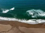 Rip Current Rescue: Three Men Save Children in Gwynedd Beach Drama