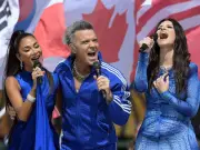 Robbie Williams' Bedazzled Tracksuit Distracts World Cup Final Viewers