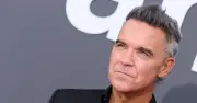 Robbie Williams says retirement 'turned his brain to cheese'