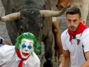 Runner Gored in Face at Spain's San Fermin Bull Run Festival