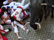 Runner Gored in Face During Chaotic Pamplona San Fermin Bull Run