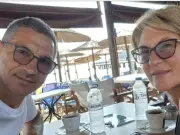 Ryanair passenger sucked through window, wife clings on