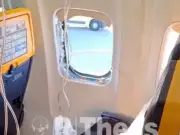 Ryanair passengers stuff suitcase in smashed window after man sucked out at 20,000ft
