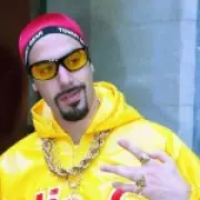 Sacha Baron Cohen Surprises Wimbledon as Ali G in Shellsuit
