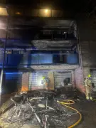 Six rescued from Woolwich flat fire, five adults and child hospitalised