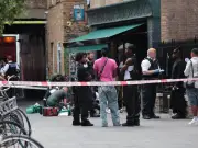 Soho stabbing: Police swarm London tourist area, man stretchered into ambulance