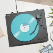 Sony promotes vinyl record player while ending physical PlayStation games