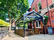 South Manchester pub with two beer gardens and play area loved by families