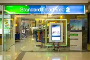 Standard Chartered launches £750m share buyback after record profits