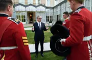Starmer Attends Bastille Day Parade Ahead of Burnham Succession