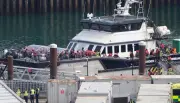 Sudanese teen charged with piloting small boat as 641 migrants cross