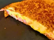Swap butter for mayonnaise in cheese toasties for better results