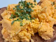 Swap Milk and Butter for Sour Cream to Make Fluffier Scrambled Eggs