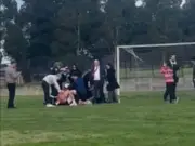 Teen, 15, stabbed outside school by machete-wielding gang in Melbourne