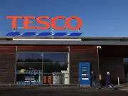 Tesco Trials 6.5ft AI Robot 'Tally' to Scan Shelves in Store