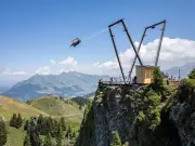 Thrillseekers soar over Swiss Alps on giant mountain swing