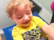 Toddler woke up looking grey before rare brain injury diagnosis