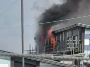Toddlers evacuated from holiday club as fire rips through school