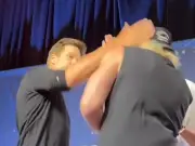 Tom Brady Slaps Logan Paul at Fanatics Fest as Feud Intensifies