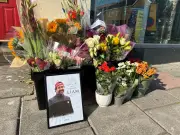 Tributes to Popular Big Issue Seller Killed in House Fire Pile Up Outside Swansea Shop